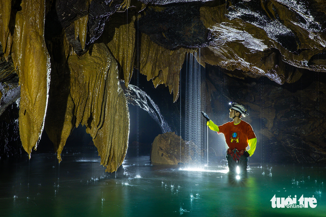 Water dripping through the cave ceiling formed million-year-old stalactites shining brilliantly like diamonds in Va Cave in Quang Binh Province, central Vietnam. Photo: Ngo Tran Hai An