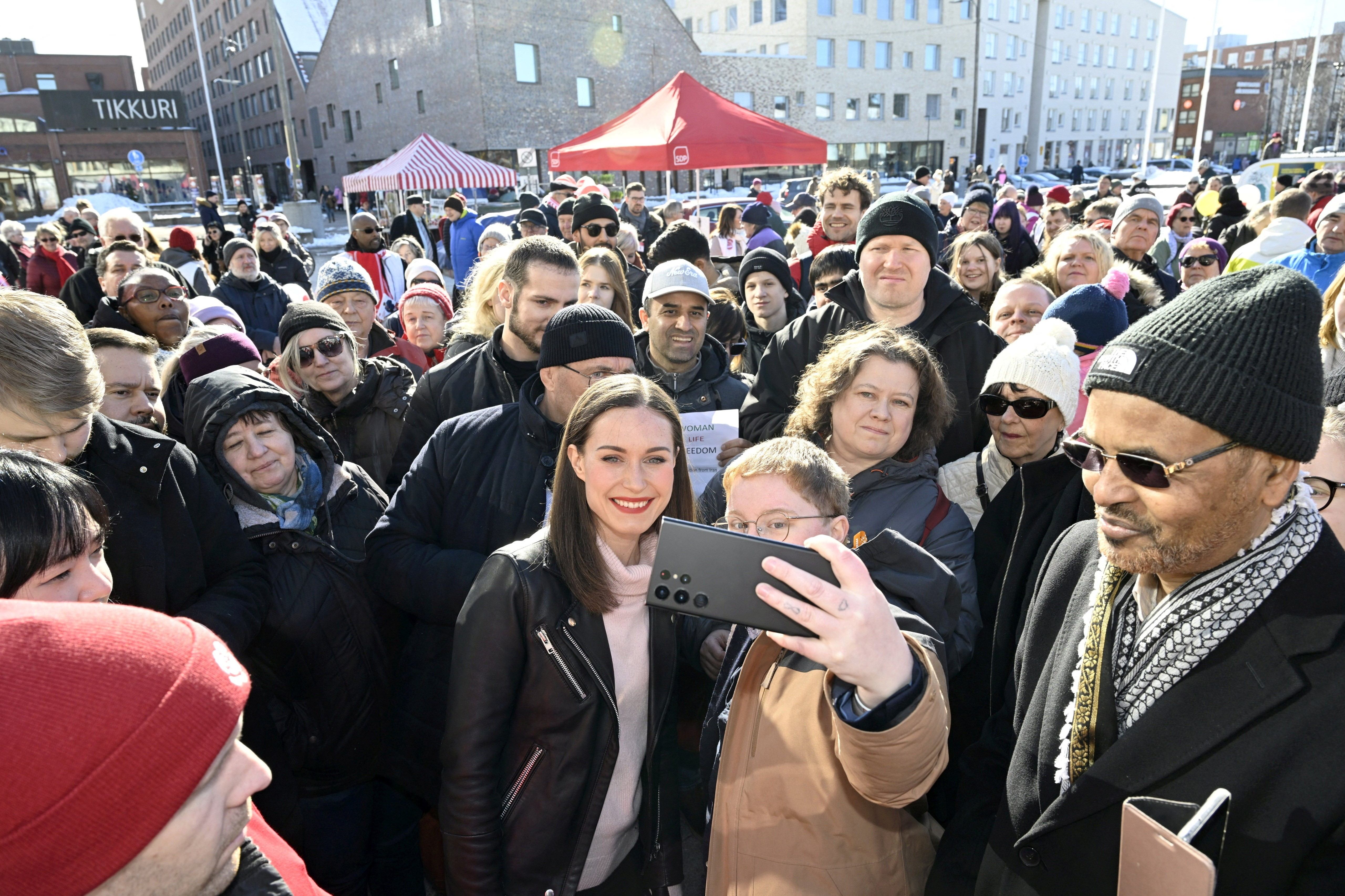 Finnish Prime Minister, Chair of the Social Democratic Party (SDP) Sanna Marin poses for a selfie during her elections rally, ahead of the April 2 Finish parliamentary elections in Vantaa, Finland, March 31, 2023. Photo: Reuters