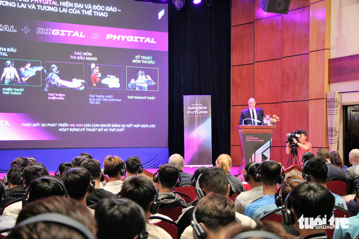 A photo shows Russian Deputy Prime Minister Dmitry Chernyshenko introducing the Games of the Future and Phygital at an event in Hanoi on Friday. Photo: Duy Linh / Tuoi Tre