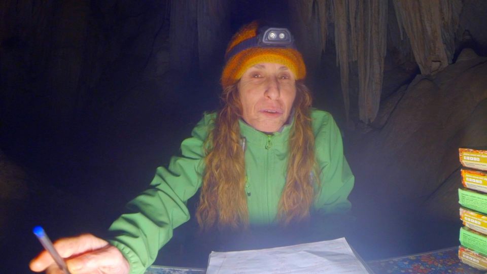Beatriz Flamini, a Spanish mountaineer who has been isolated for 500 days in a cave is pictured during her daily life at the cave in Motril, Spain in this screen grab taken from a handout video in November 2021. Dokumalia Producciones/Handout via Reuters