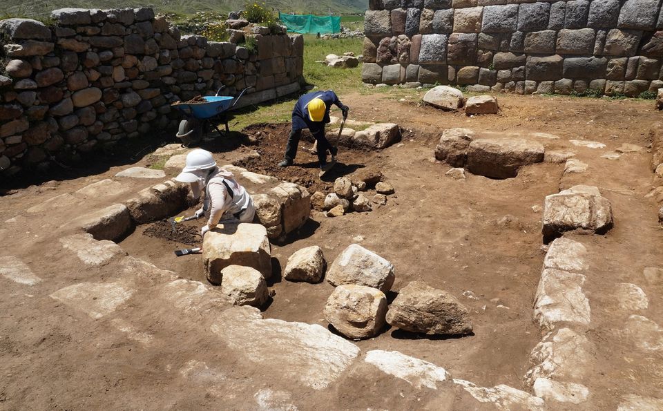 Archaeologists work in the remains of an ancient ceremonial Inca bathroom, discovered in a sector known as Inkawasi (House of the Inca), at the archaeological site Huanuco Pampa, in Huanuco, Peru March 20, 2023. Peru Culture Ministry/Handout via Reuters