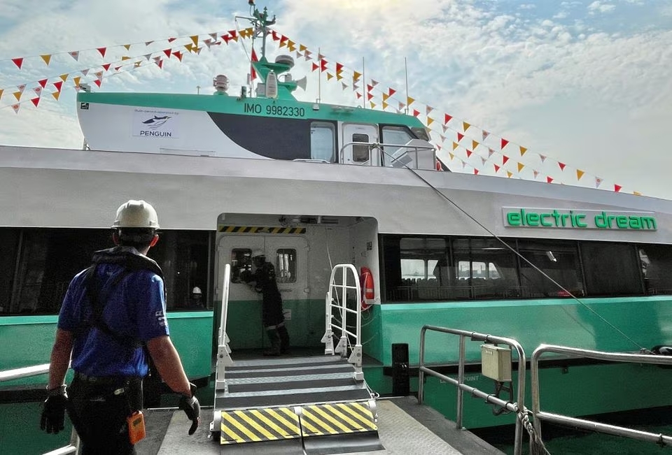 Crew members operate onboard Singapore's first electric ferry Penguin Refresh, docked at Shell Bukom Island, Singapore April 17, 2023. Photo: Reuters