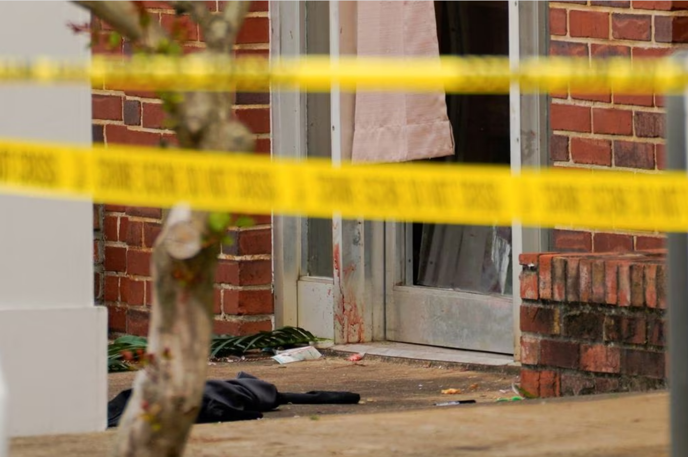 Blood is seen on the doorframe of Mahogany Masterpiece Dance Studio, a day after a shooting at a teenager's birthday party in the dance studio in Dadeville, Alabama, U.S., April 16, 2023. Photo: Reuters