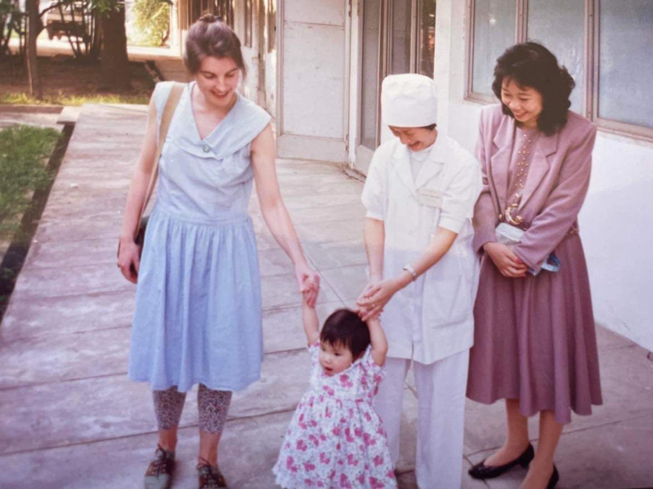 Iris/Mai Thanh grew up with loving adoptive parents, photo provided
