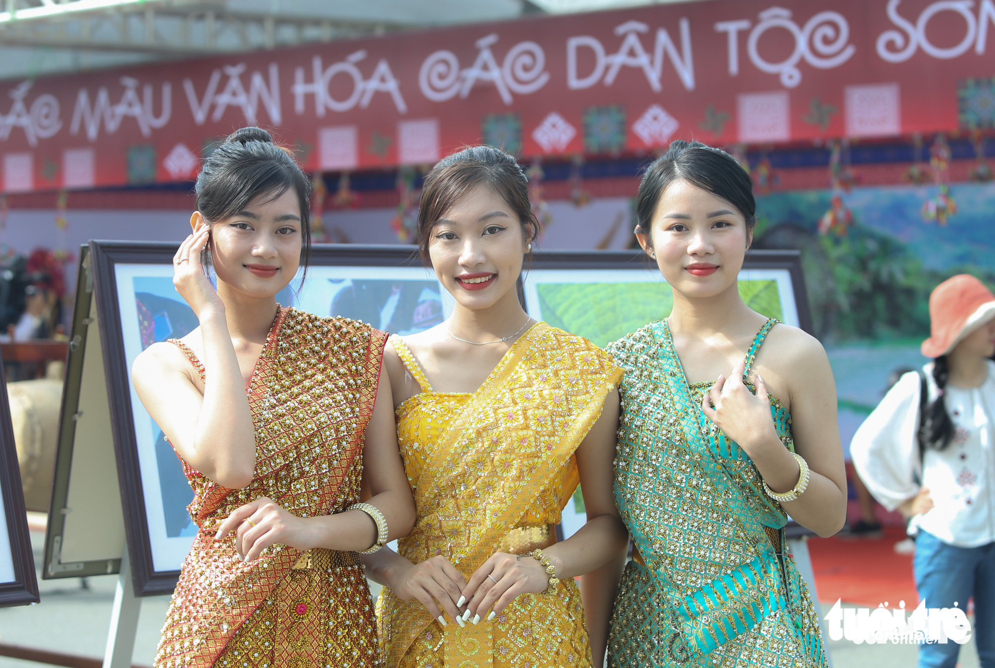 Tourists don a traditional Khmer costume at the Vietnam Ethnic Village Of Culture and Tourism in Son Tay District, Hanoi. Photo: Nguyen Hien / Tuoi Tre