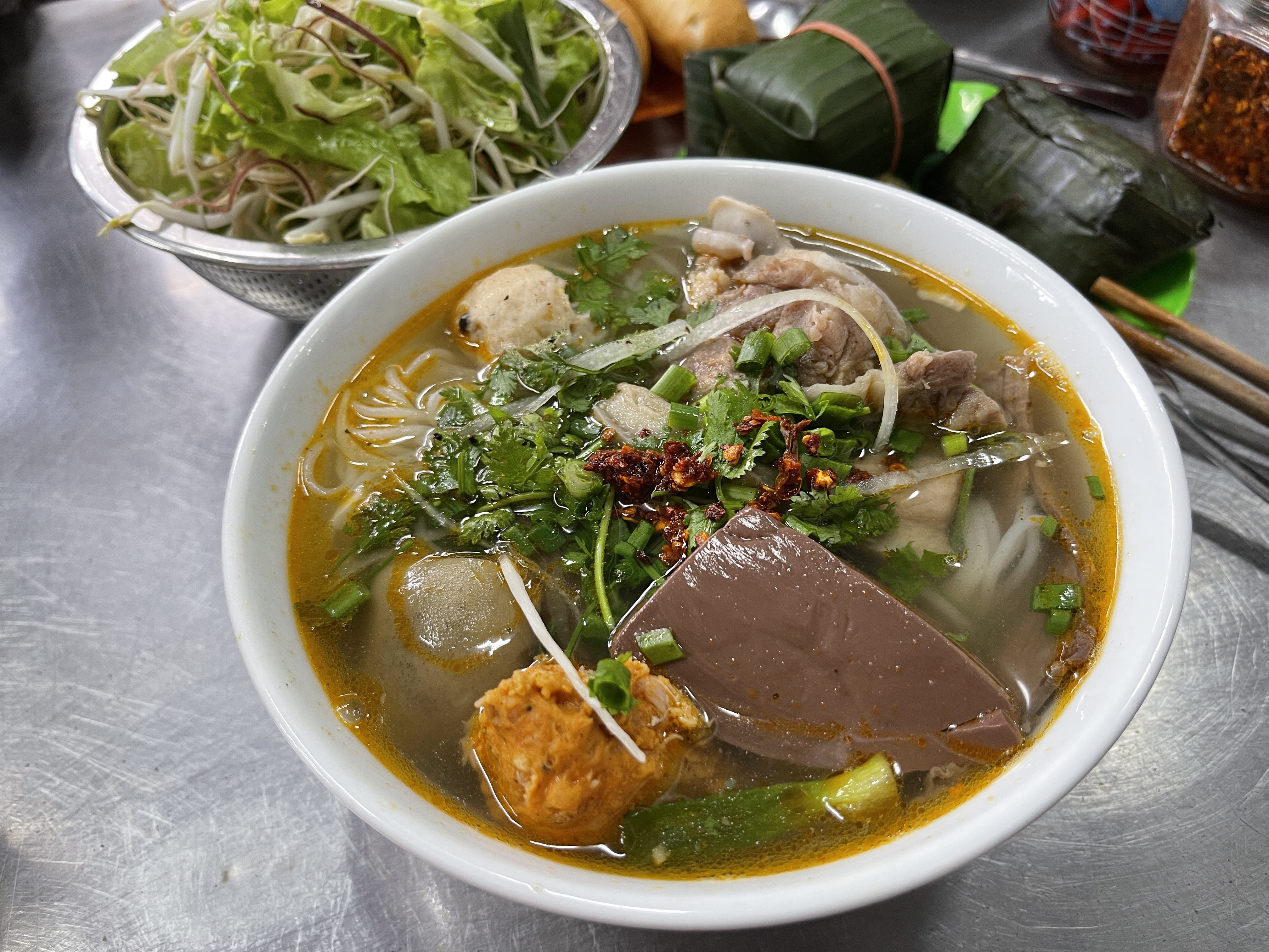 A bowl of bún bò (spicy beef noodles) is served at a shop in the central city of Hue. Photo: Dong Nguyen / Tuoi Tre News
