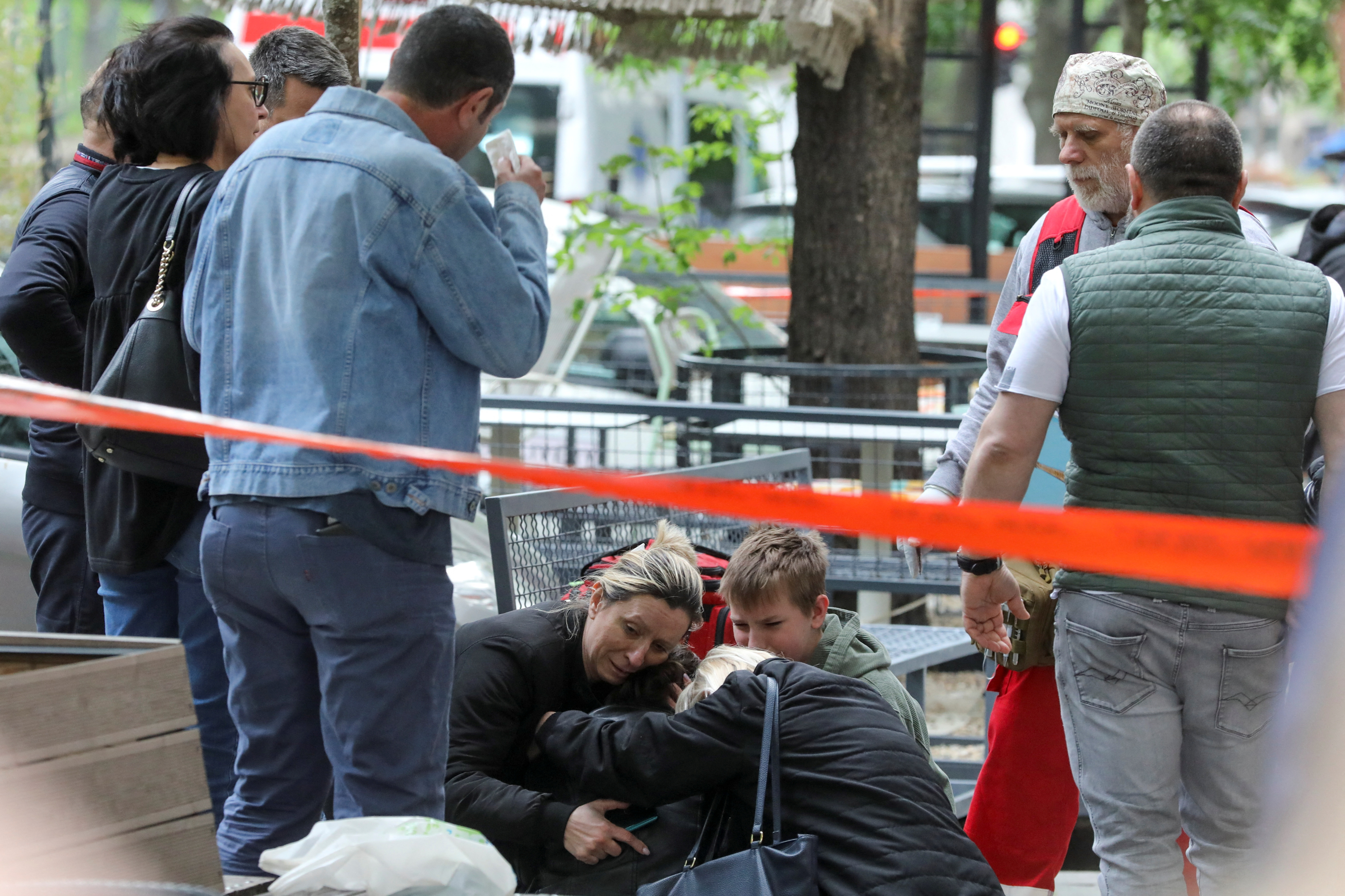 People react after a 14-year-old boy opened fire on other students and security guards at a school in downtown Belgrade, Serbia, May 3, 2023. Photo: Reuters