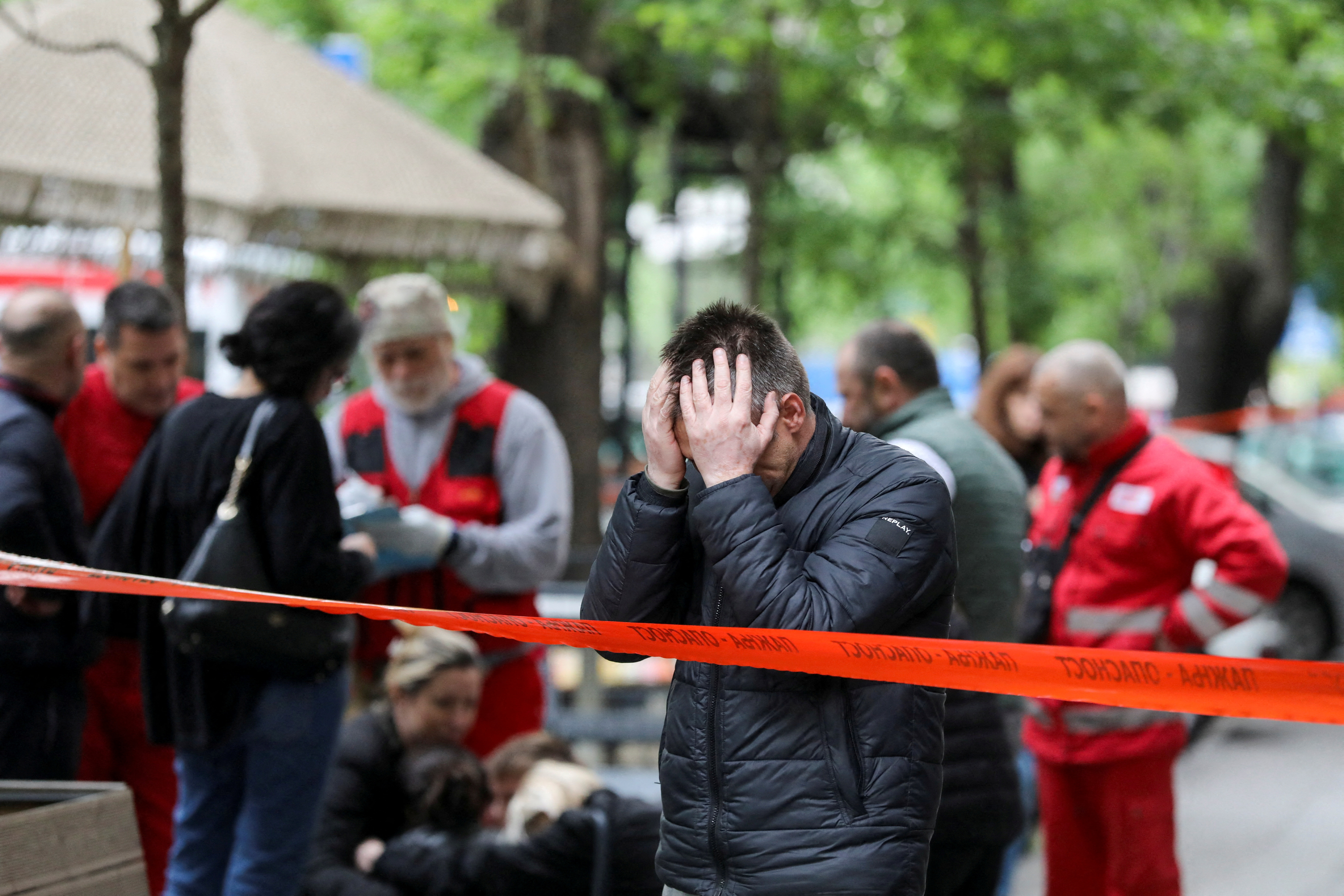 People react after a 14-year-old boy opened fire on other students and security guards at a school in downtown Belgrade, Serbia, May 3, 2023. Photo: Reuters