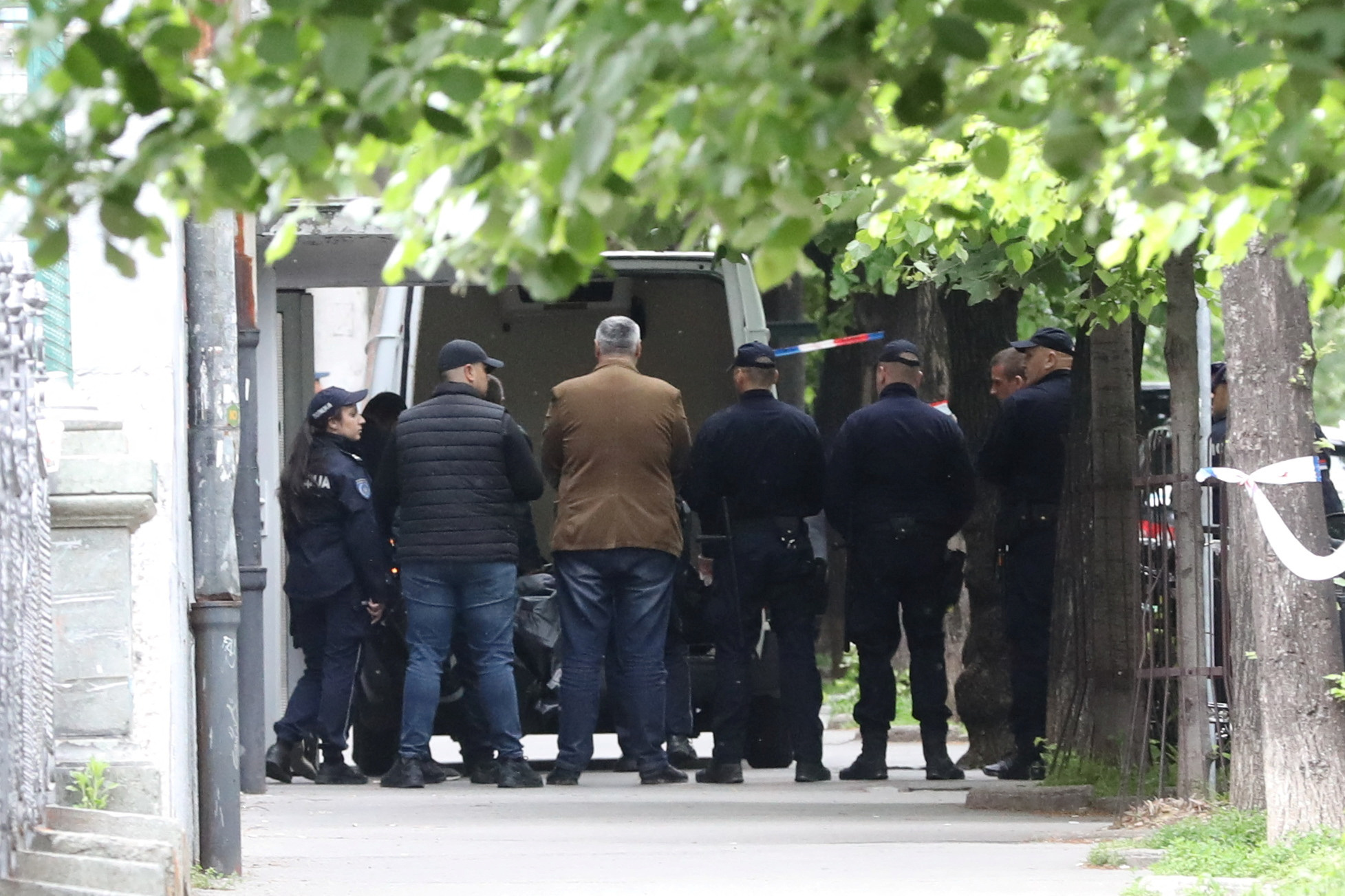 Police officers secure the area after a 14-year-old boy opened fire on other students and security guards at a school in downtown Belgrade, Serbia, May 3, 2023. Photo: Reuters