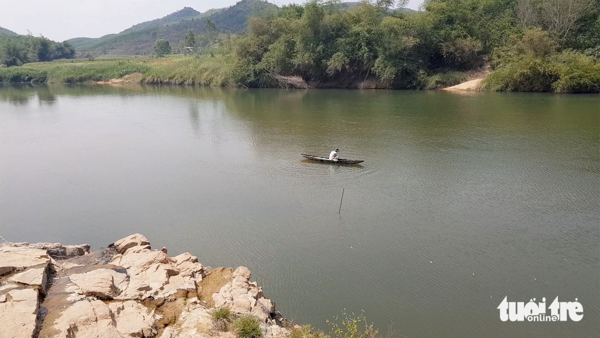 Locals catch fish in the Ky Lo River.