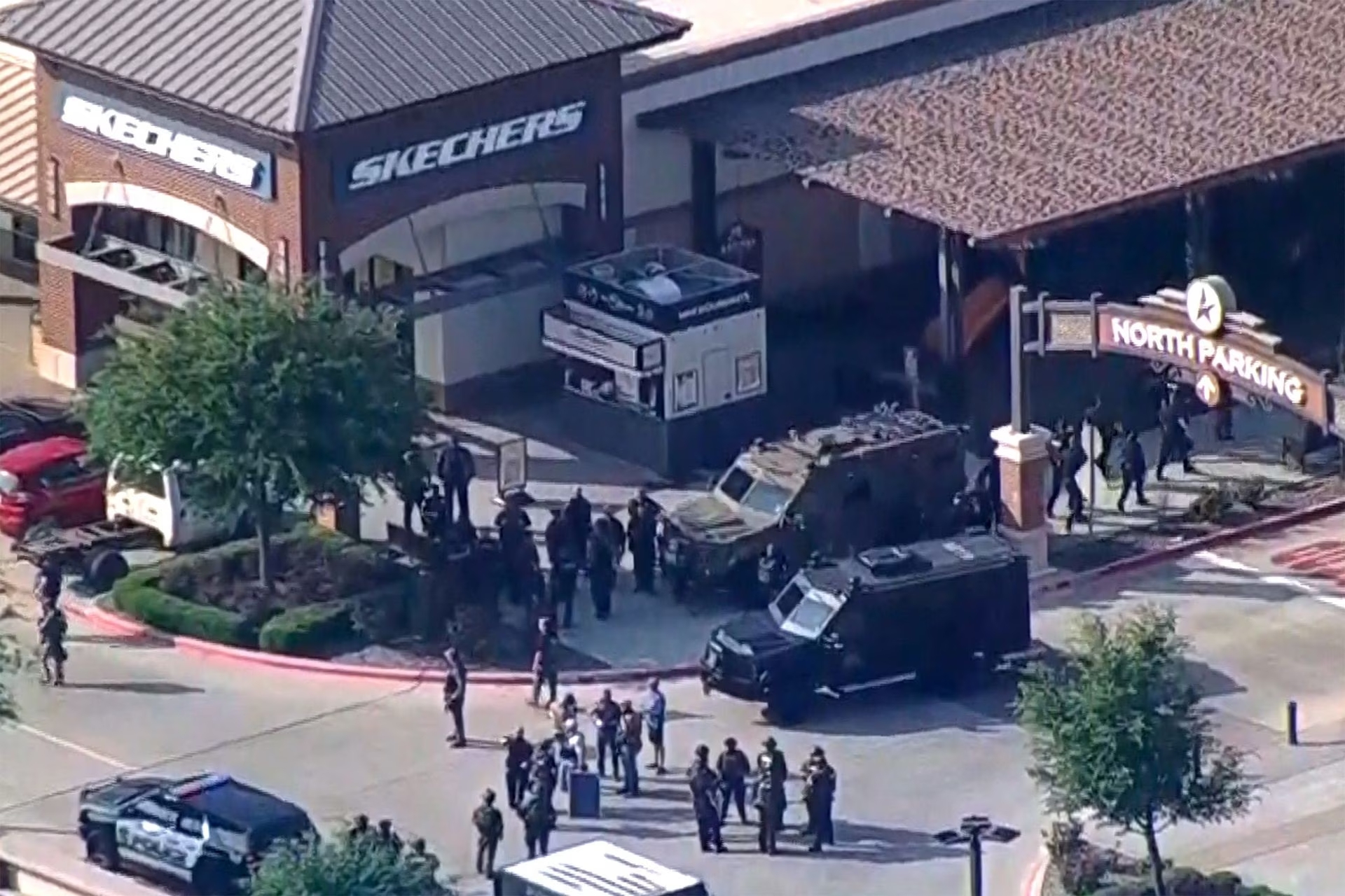 Police respond to a shooting in the Dallas area's Allen Premium Outlets, which authorities said has left multiple people injured in Allen, Texas, U.S. May 6, 2023 in a still image from video. Photo: Reuters