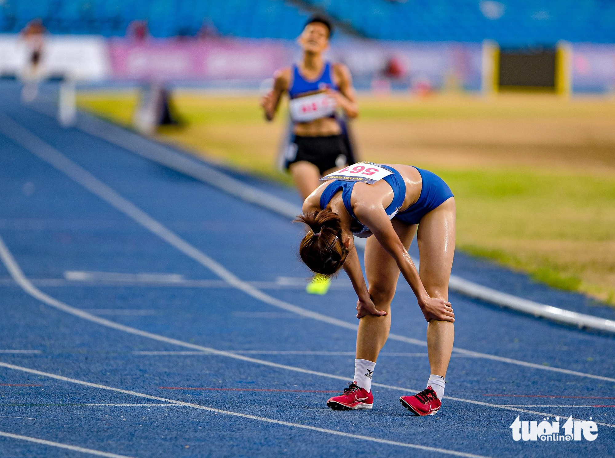Vietnamese runner Nguyen Thi Oanh celebrating her victory after finishing first in the women's 3,000-meter hurdles at the 2023 Southeast Asian Games in Cambodia, May 9, 2023