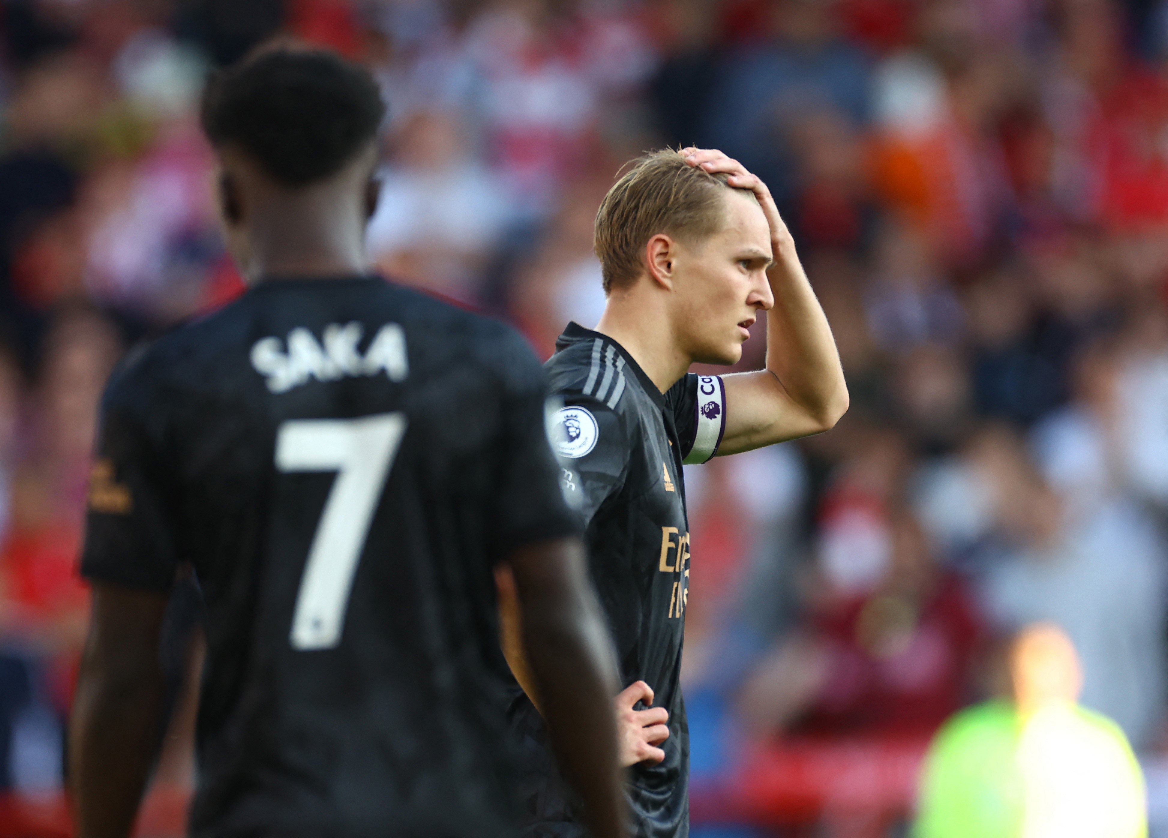 Soccer Football - Premier League - Nottingham Forest v Arsenal - The City Ground, Nottingham, Britain - May 20, 2023 Arsenal's Martin Odegaard reacts. Photo: Reuters