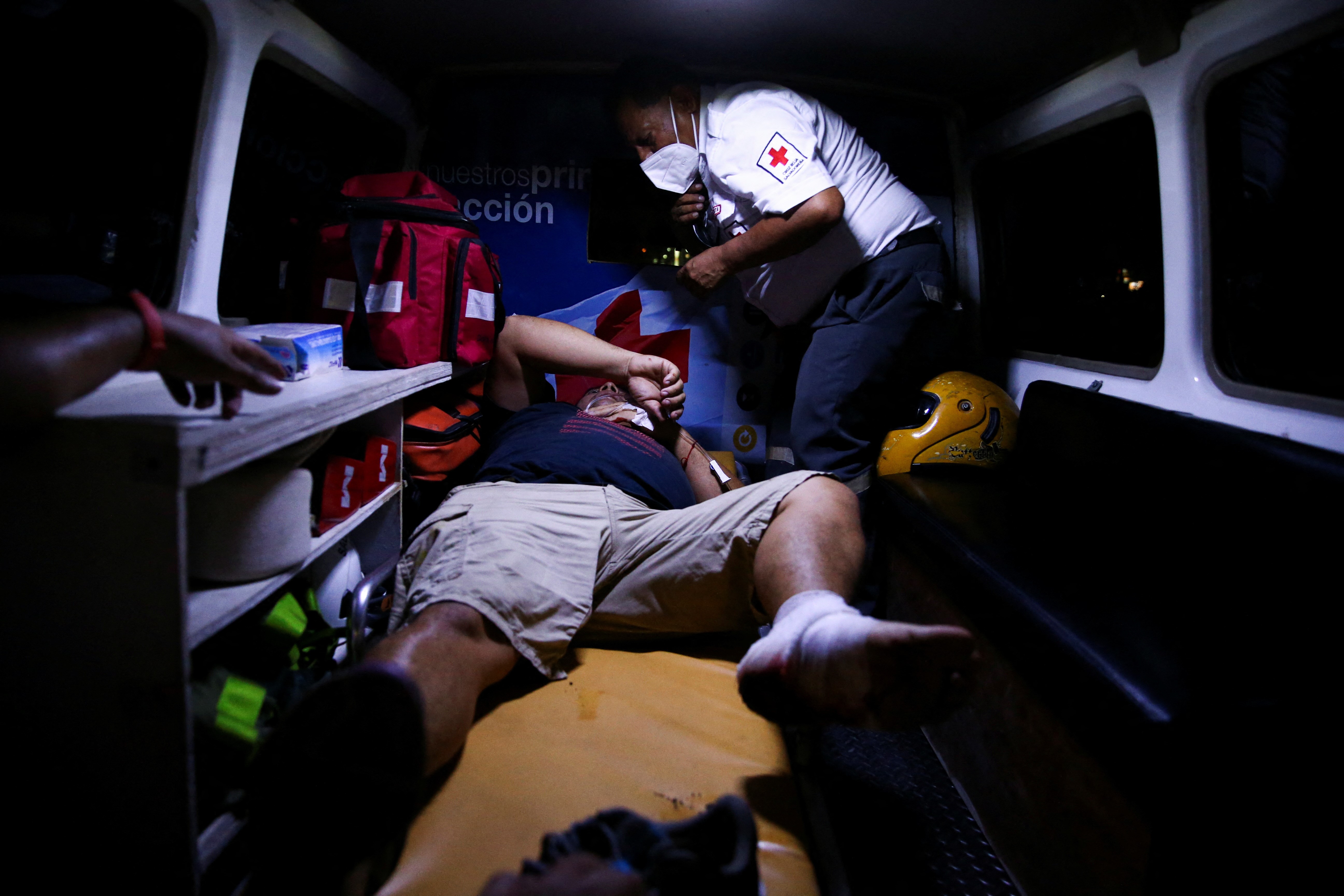 A fan is attended to in an ambulance following a stampede prior to a soccer game between C.D. FAS Vs. Alianza F.C. at the Cuzcatlan stadium, in San Salvador, El Salvador May 20, 2023. Photo: Reuters