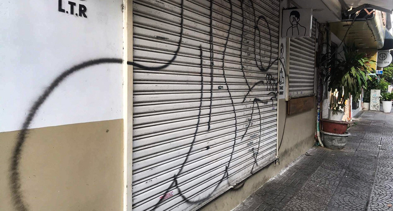 Graffiti is seen on a shop on Le Thi Rieng Street in District 1, Ho Chi Minh City, May 21, 2023. Photo: Supplied