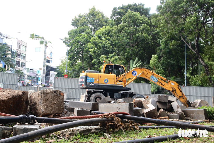 Part of park used for temporary road near airport in Ho Chi Minh City