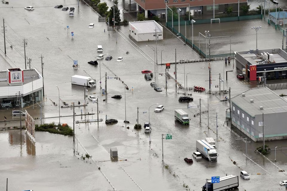 A flooded intersection following heavy rain brought about by Typhoon Mawar is pictured from a Kyodo News helicopter in Toyokawa, Aichi Prefecture, central Japan in this photo taken by Kyodo on June 3, 2023. Mandatory credit Kyodo/via Reuters