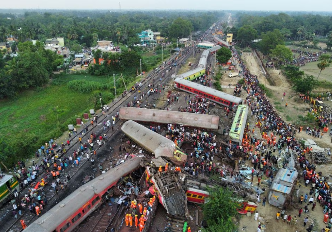 Families, rescuers search for victims of India's worst train crash in decades