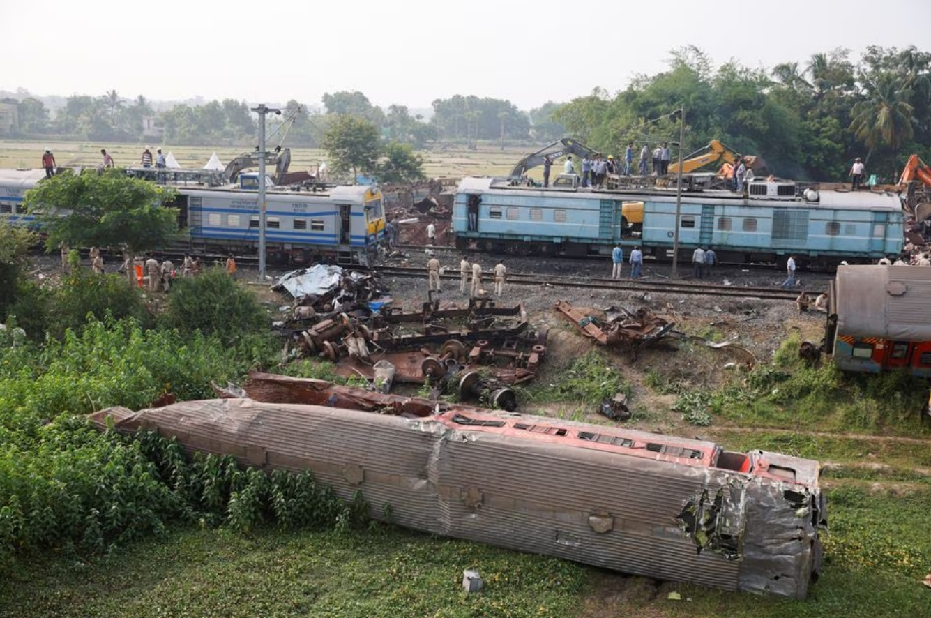 A passenger train hit a stationary freight train, went off the tracks and hit another passenger train passing in the opposite direction near the district of Balasore in the eastern state of Odisha, killing at least 275 people on June 2, 2023. Photo: Reuters