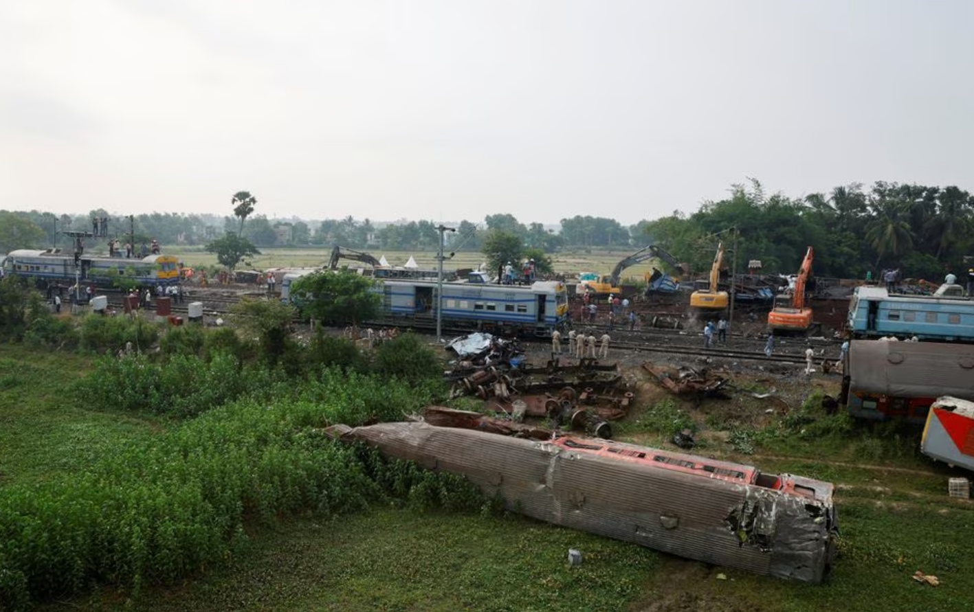 A passenger train hit a stationary freight train, went off the tracks and hit another passenger train passing in the opposite direction near the district of Balasore in the eastern state of Odisha, killing at least 275 people on June 2, 2023. Photo: Reuters