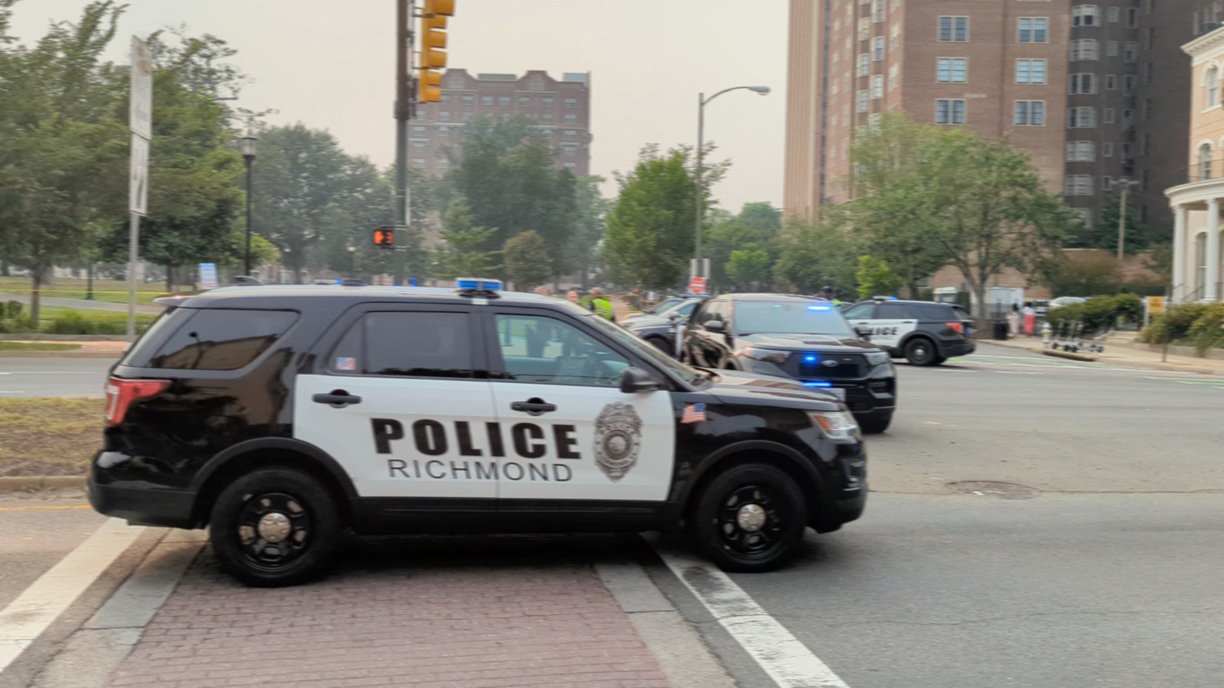 Police vehicles are seen parked near a park where, according to the police, a gunman opened fire, in Richmond, Virginia U.S. JUNE 6, 2023, in this screen grab obtained from a social media video. Photo: Reuters