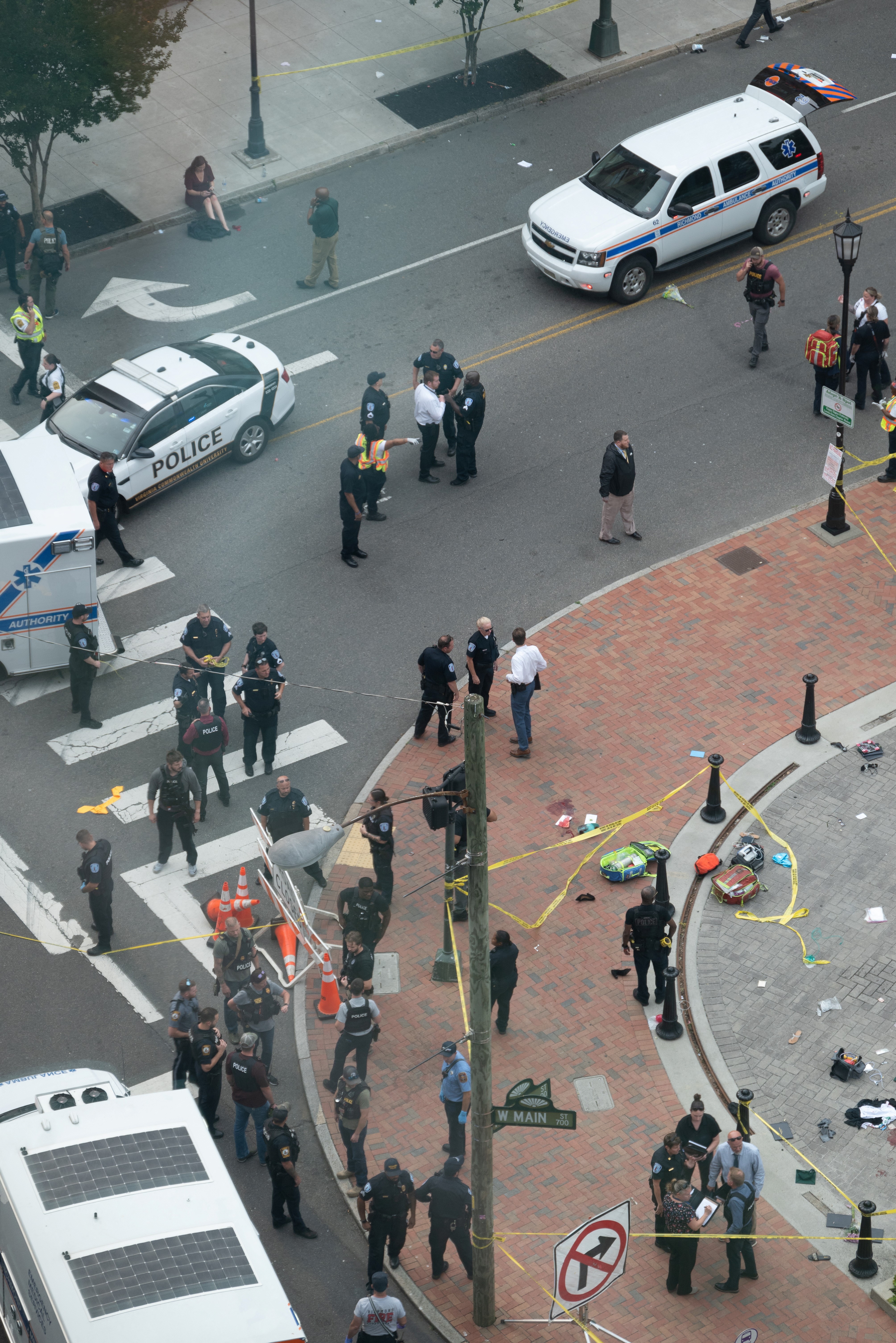Law enforcement officers investigate at the scene after a gunman opened fire in a park as high school graduates and their families emerged from a theater where commencement exercises had just concluded, in Richmond, Virginia, U.S. June 6, 2023 in this picture obtained from social media. Photo: Reuters