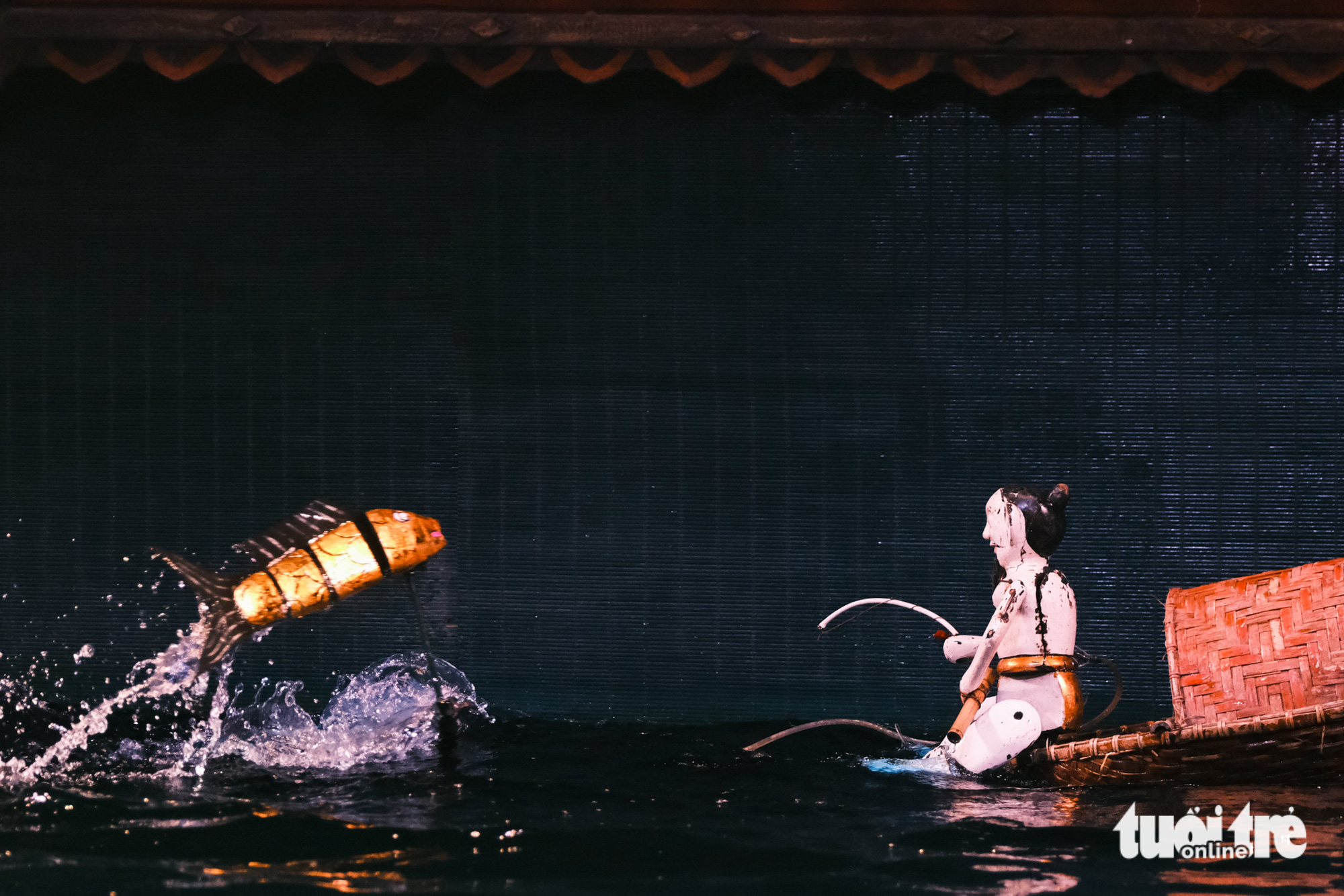 Daily life on display in a water puppet show. Photo: Mai Thuong / Tuoi Tre