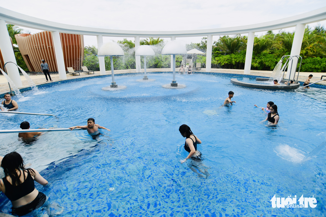 Travelers swim at Minera Hot Springs Binh Chau