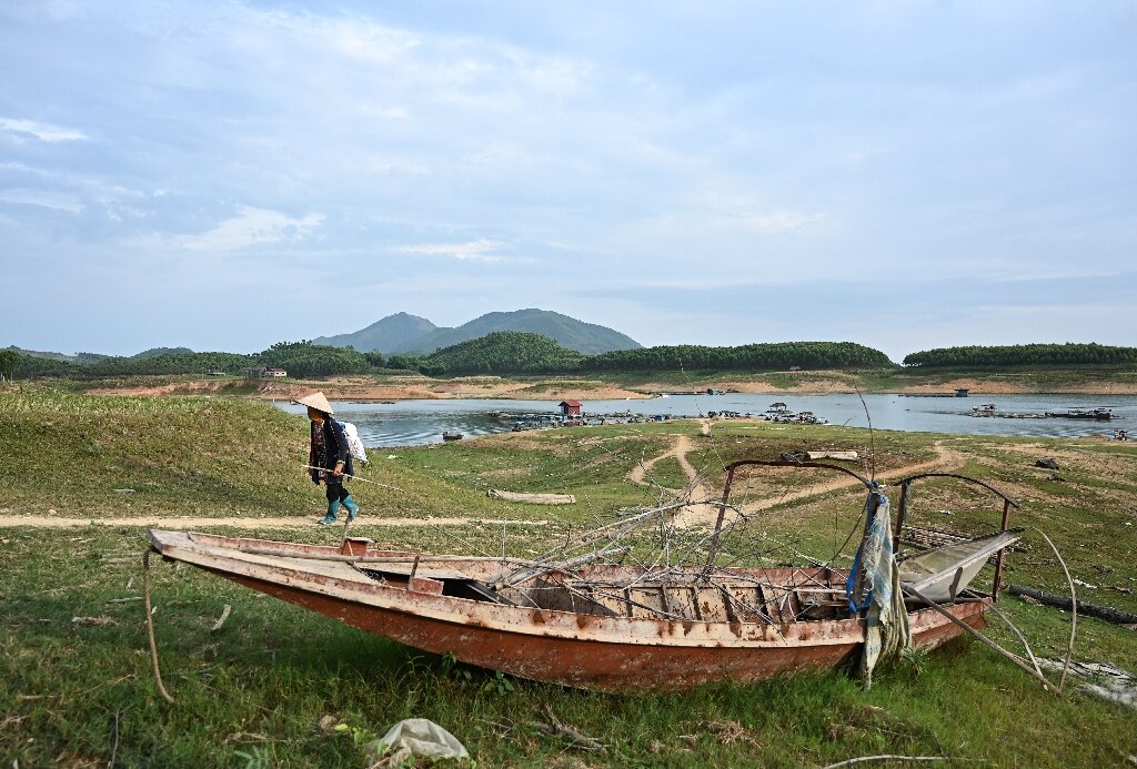 The heatwave has left those who relied on fishing for their living worried about having even enough water for their rice fields and families. Photo: AFP