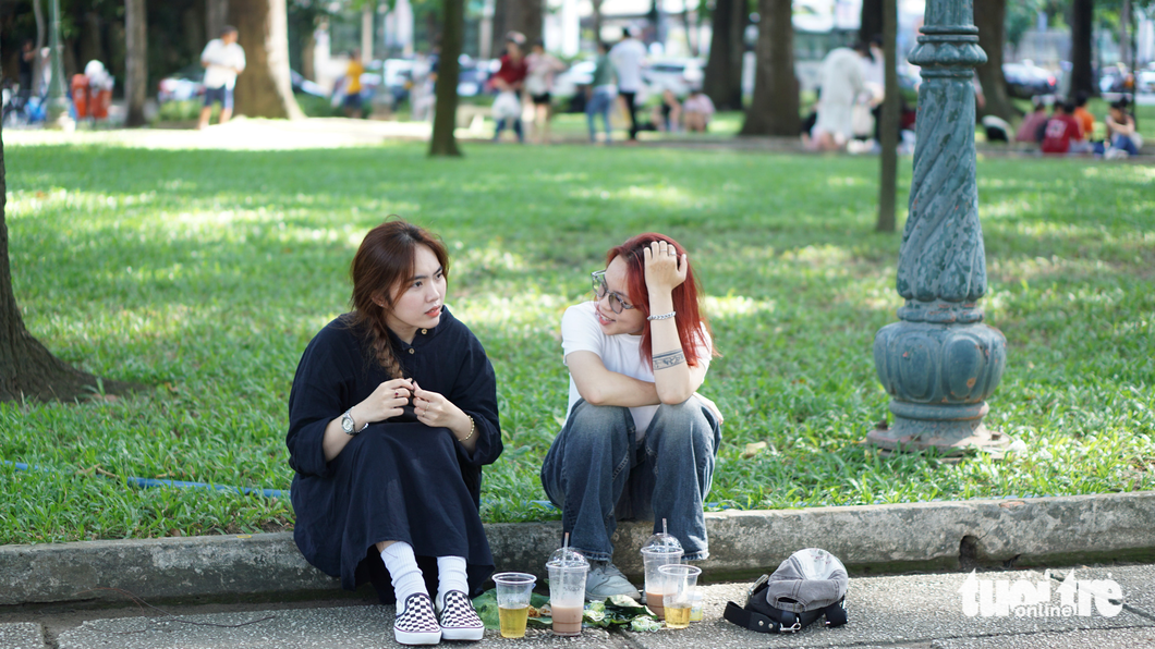 Young people love 'ca phe bet', or drinking coffee while sitting on the ground, in Ho Chi Minh City due to the airy space and comfort. Photo: Tran Mac / Tuoi Tre