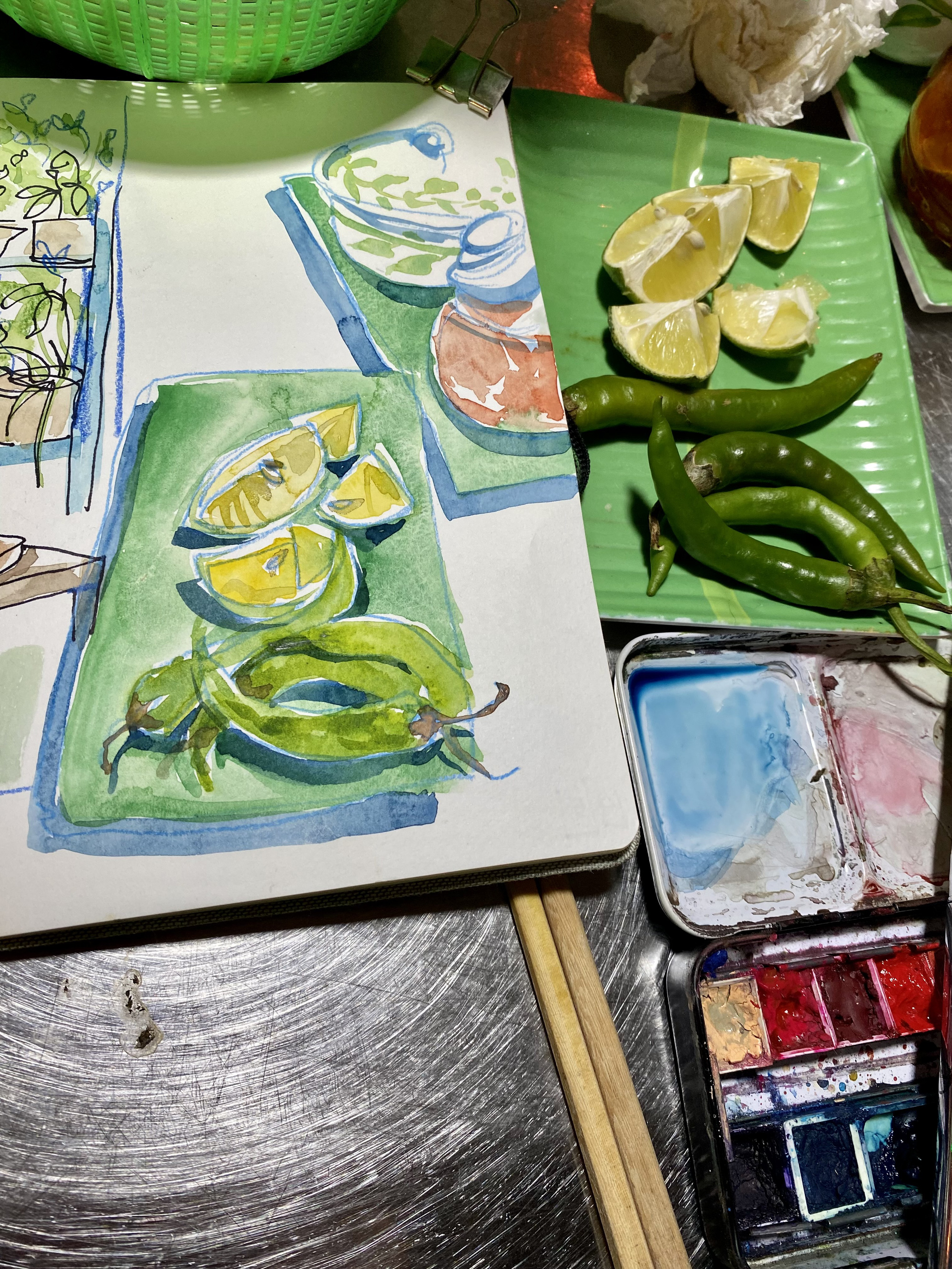 Green chilis and lime, the two spices often found at local eateries in Vietnam, sketched by Liz McGrath. Photo: Supplied