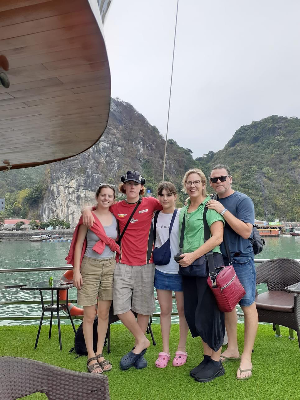 Liz McGrath (second from right) and her family take a photo during their trip to Vietnam. Photo: Supplied