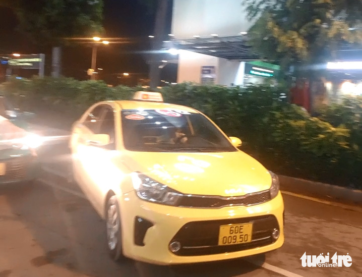 A screenshot from a video shows Dat driving his cab to the domestic passenger terminal of Tan Son Nhat International Airport in Ho Chi Minh City on May 17, 2023