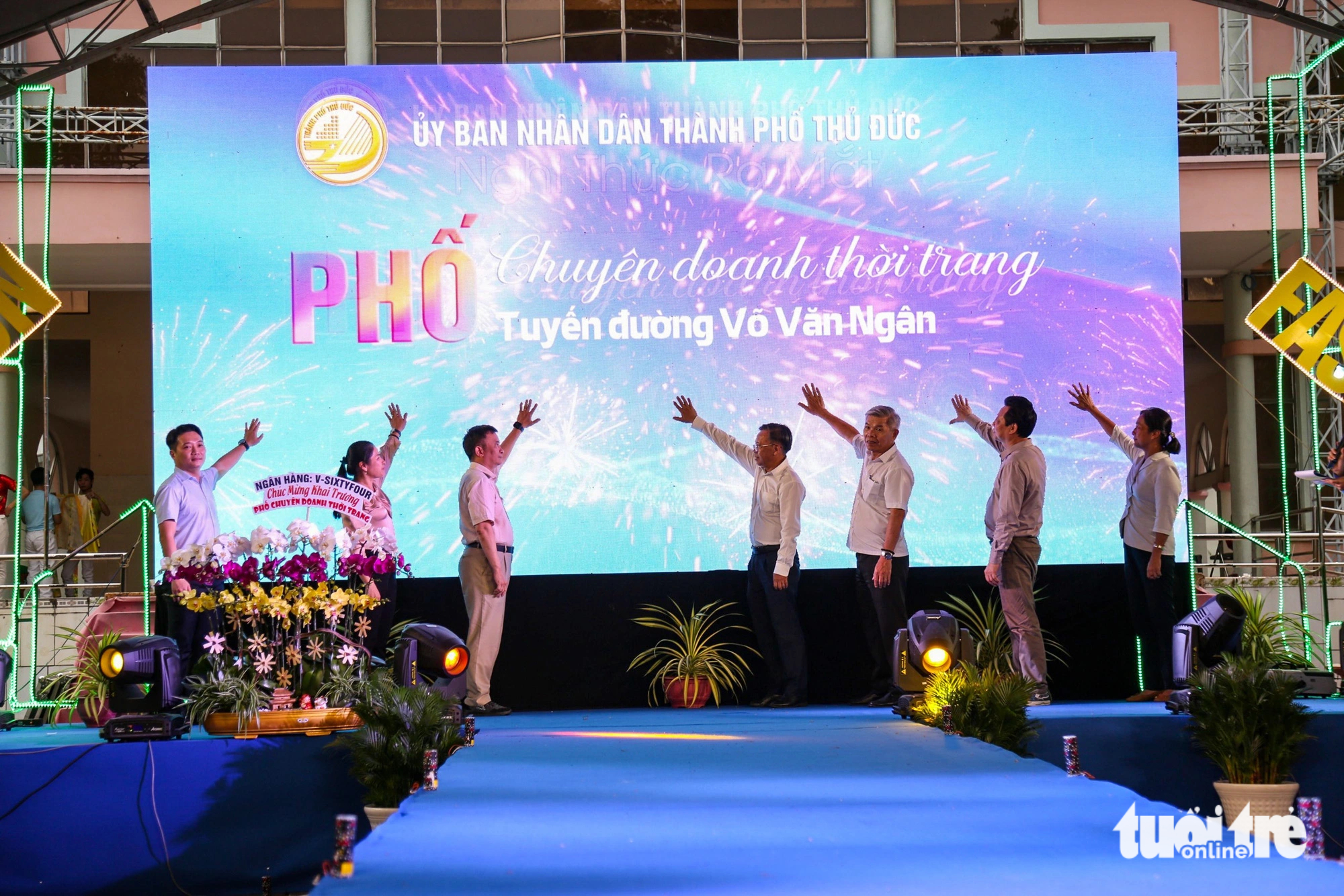 Thu Duc City officials gesture at the launch ceremony of a fashion street located on Vo Van Ngan Street in Thu Duc City, under the jurisdiction of Ho Chi Minh City on June 23, 2023.