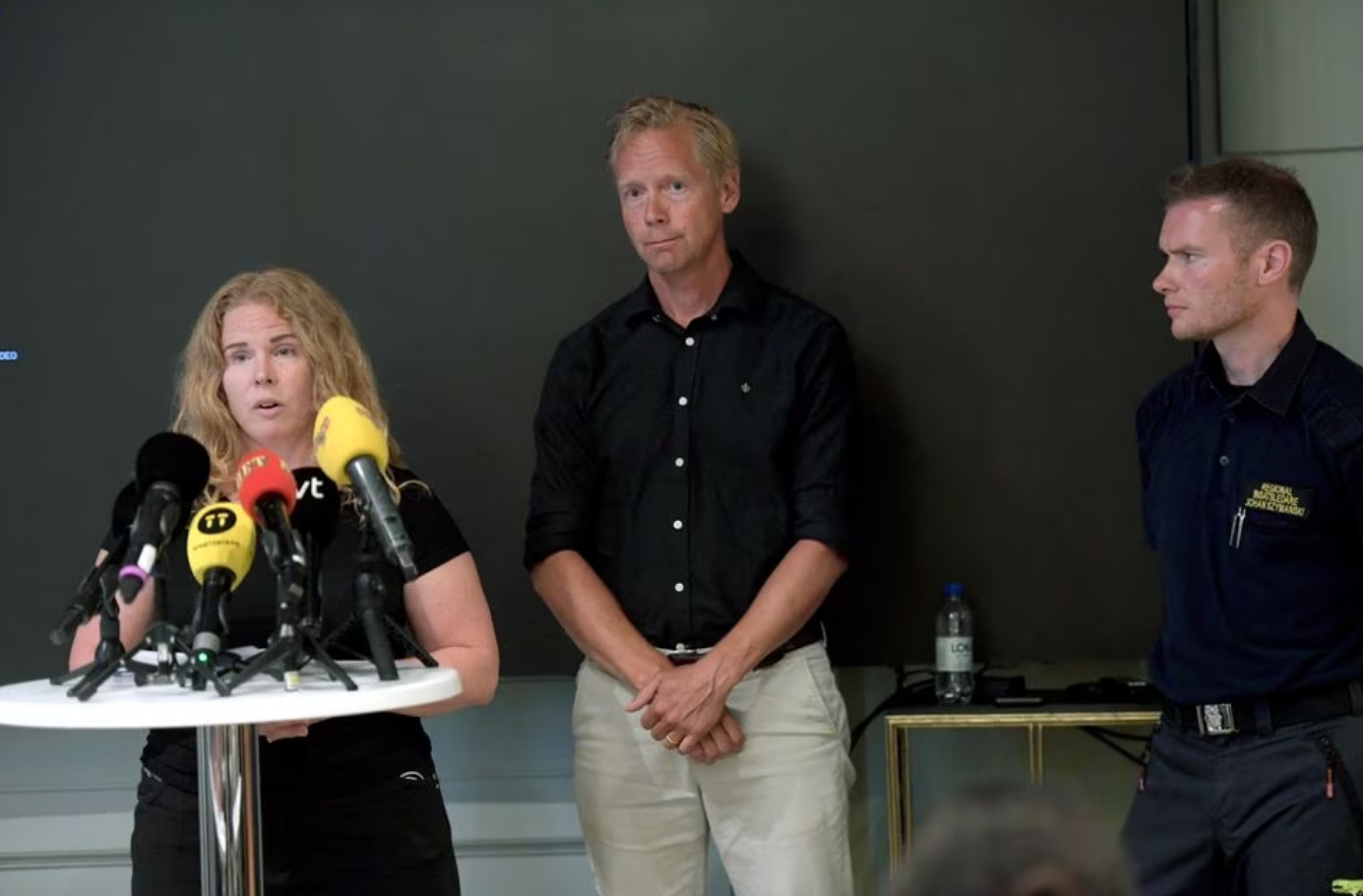 Annika Troselius, Information Manager at Parks and Resorts, Jan Eriksson, CEO Grona Lund, and Johan Szymanski, rescue manager, attend a press conference at Hotel Hasselbacken following a fatal accident that took place on the roller coaster Jetline at the Grona Lund amusement park in Stockholm, Sweden, June 25, 2023. Photo: Reuters