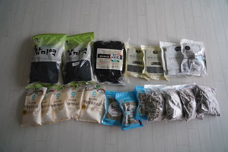 Sea products such as sea salt, dried seaweed and fish are displayed on the ground of Lee Young-min's house in Seongnam, South Korea, June 28, 2023. Photo: Reuters