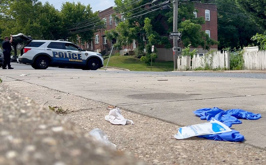 Police investigate after a mass shooting at the scene of a Fourth of July holiday weekend block party in Baltimore, Maryland, U.S. July 2, 2023 in a still image from video. Photo: Reuters