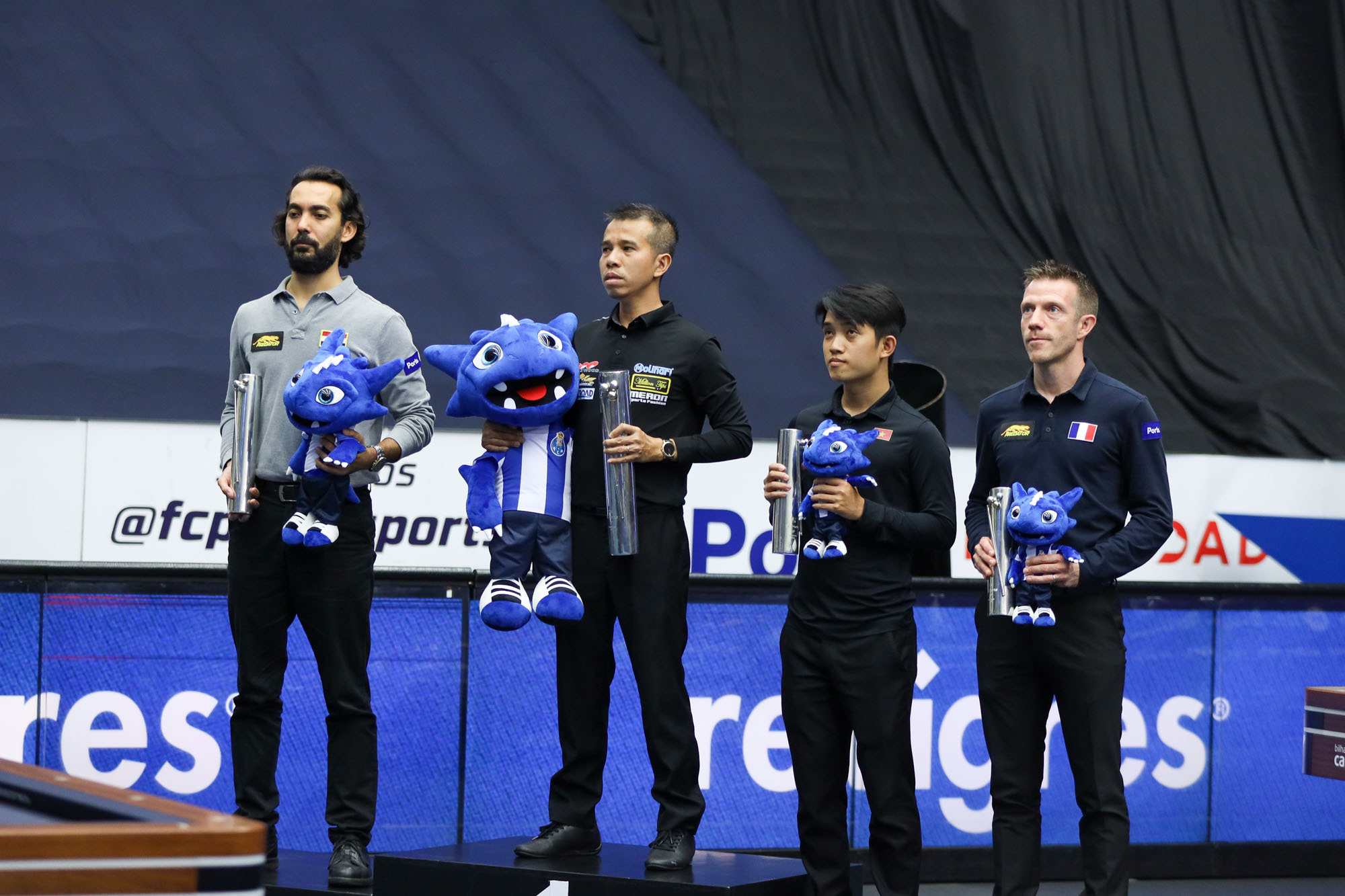 Vietnamese billiard player Tran Quyet Chien (L, 2nd) wins the Porto World Cup held in Portugal, July 2, 2023. Photo: Union Mondiale de Billard