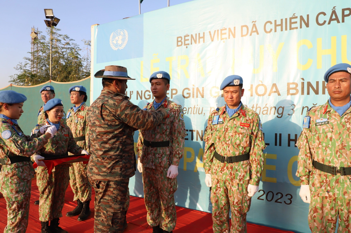 The staff members of Vietnam’s Level-2 Field Hospital Rotation 4 operating at the United Nations Mission in South Sudan are honored with the UN Peacekeeping Medals for their dedication and outstanding contributions to UN missions in March 2023. Photo: Supplied