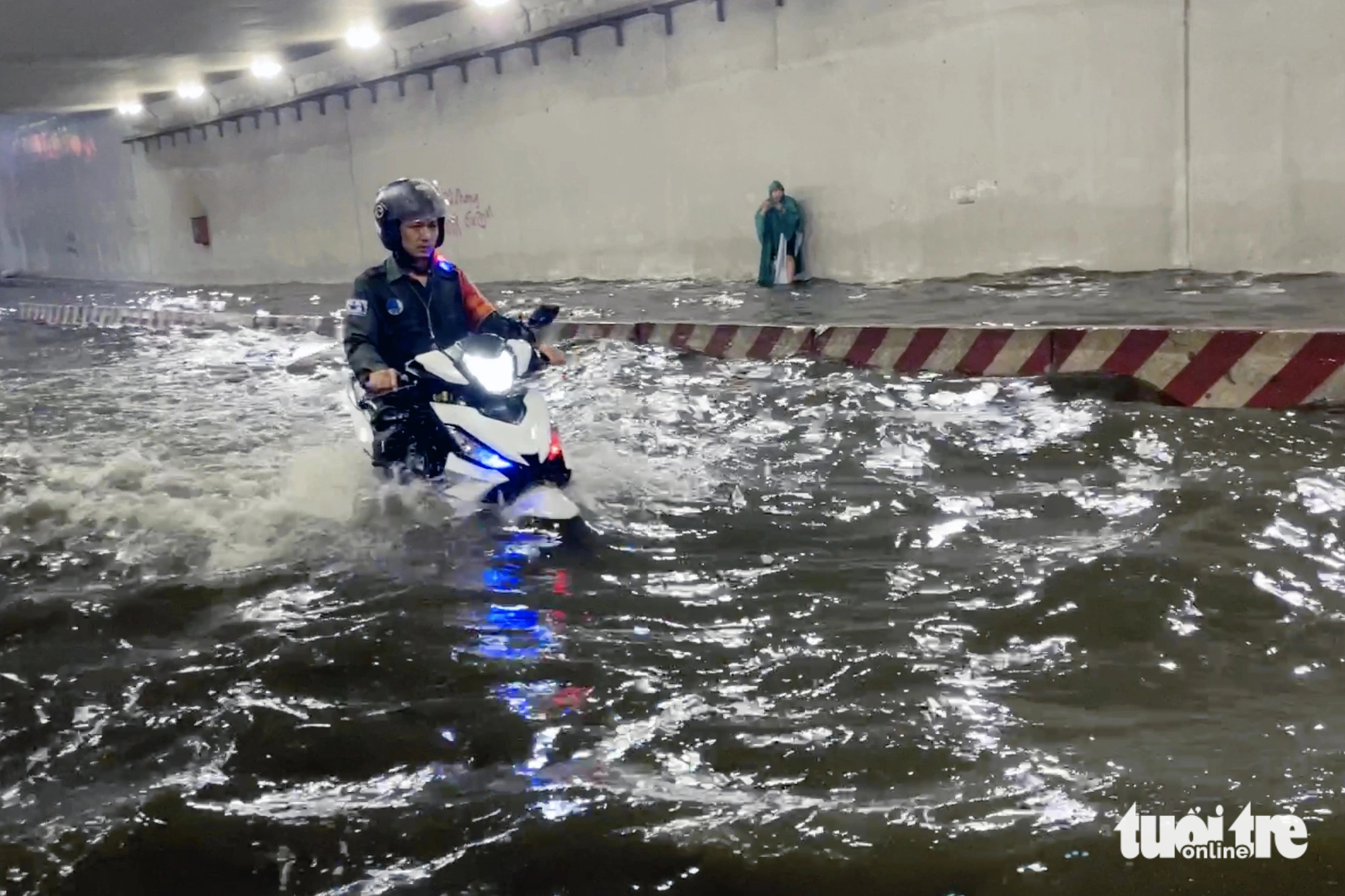 The Tan Phong Tunnel in Bien Hoa City, Dong Nai Province, southern Vietnam was about half a meter under water due to heavy rain on July 13, 2023. Photo: An Binh / Tuoi Tre