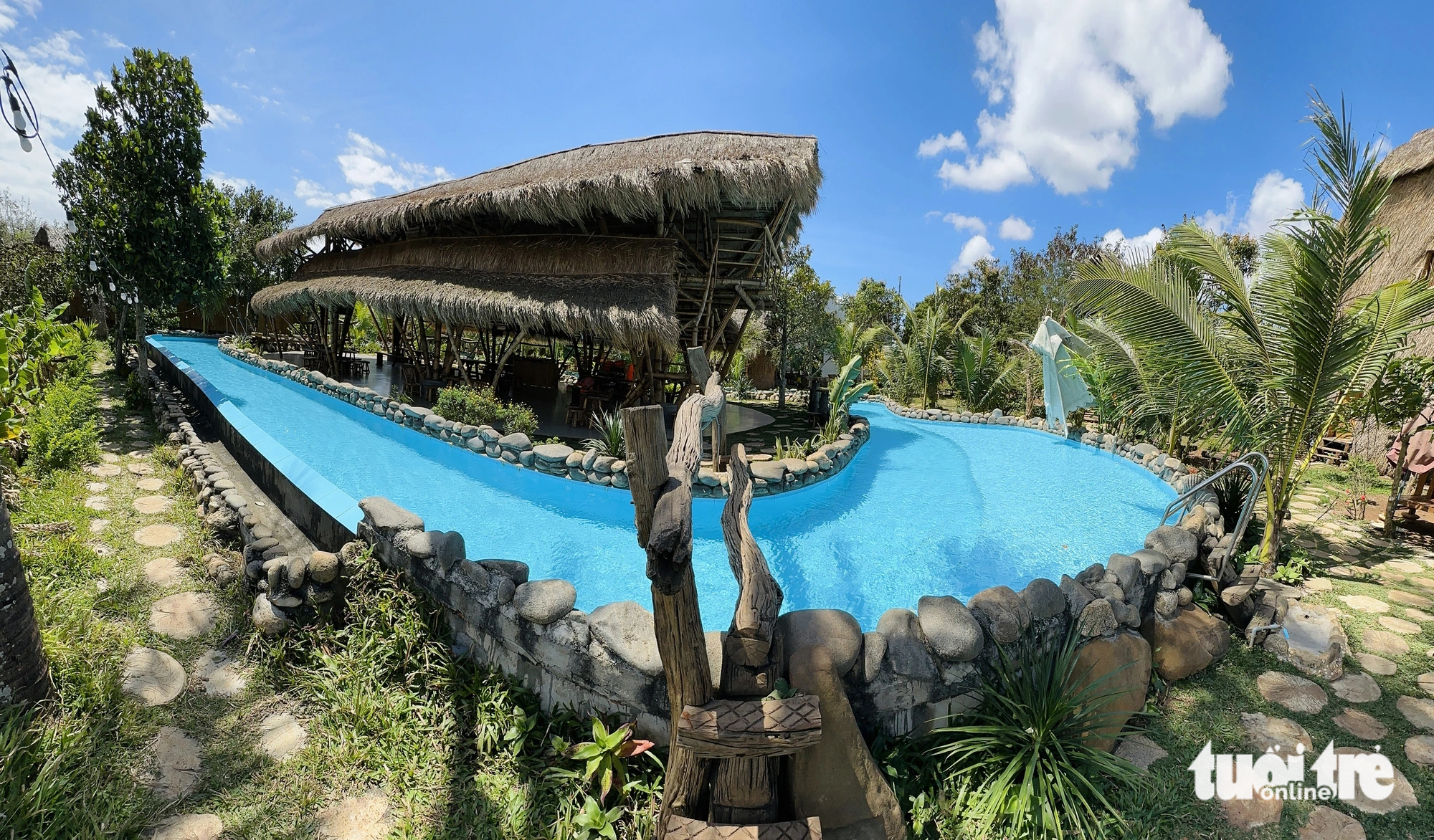 A swimming pool built on agricultural land at the tourist site. Photo: Trung Tan / Tuoi Tre