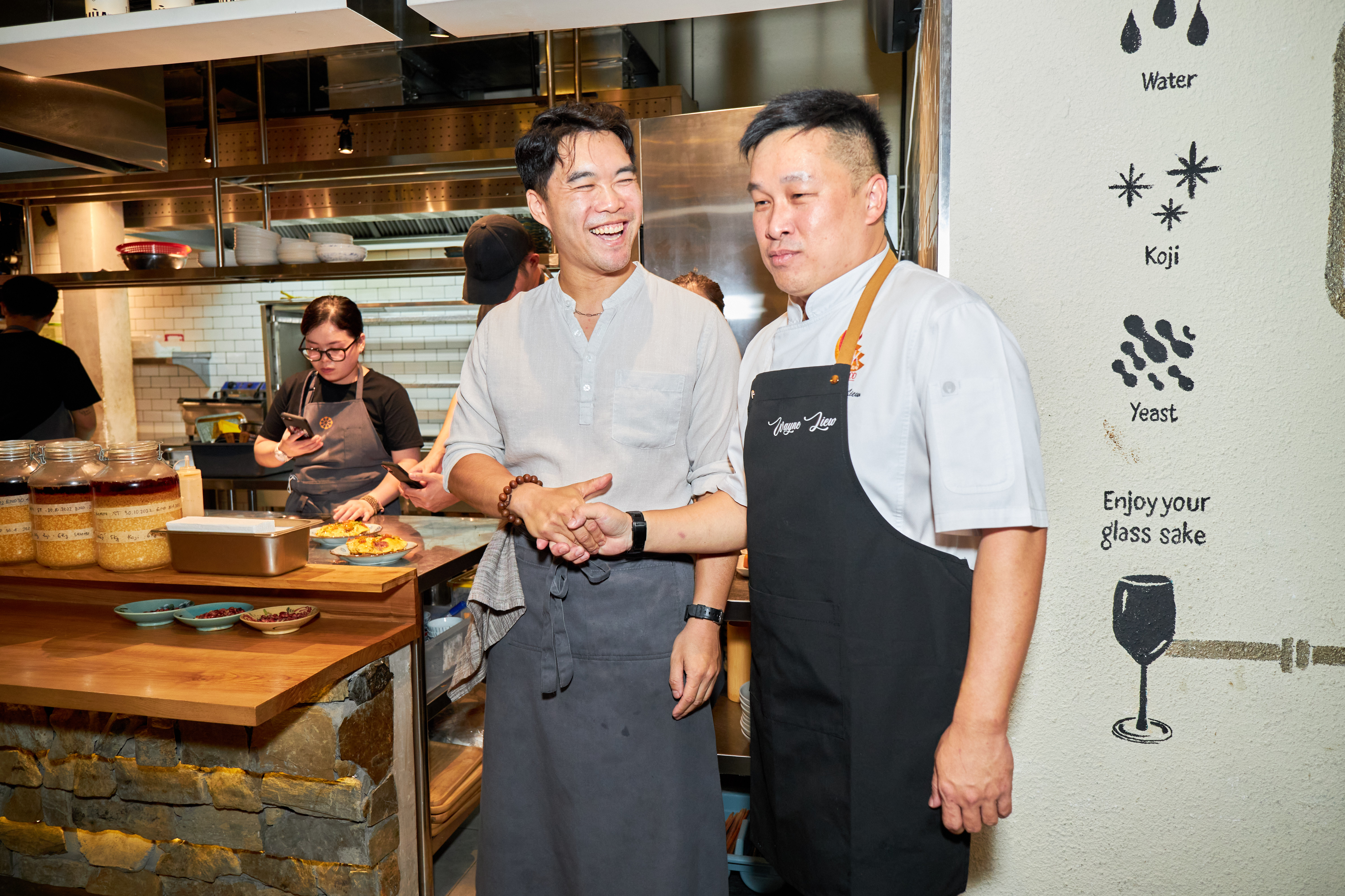 Chef Tru Lang (left) and chef Wayne Liew are seen at a media event for the Singapore Tourism Board's Tatse Obsession campaign in Ho Chi Minh City on July 28, 2023. Photo: STB