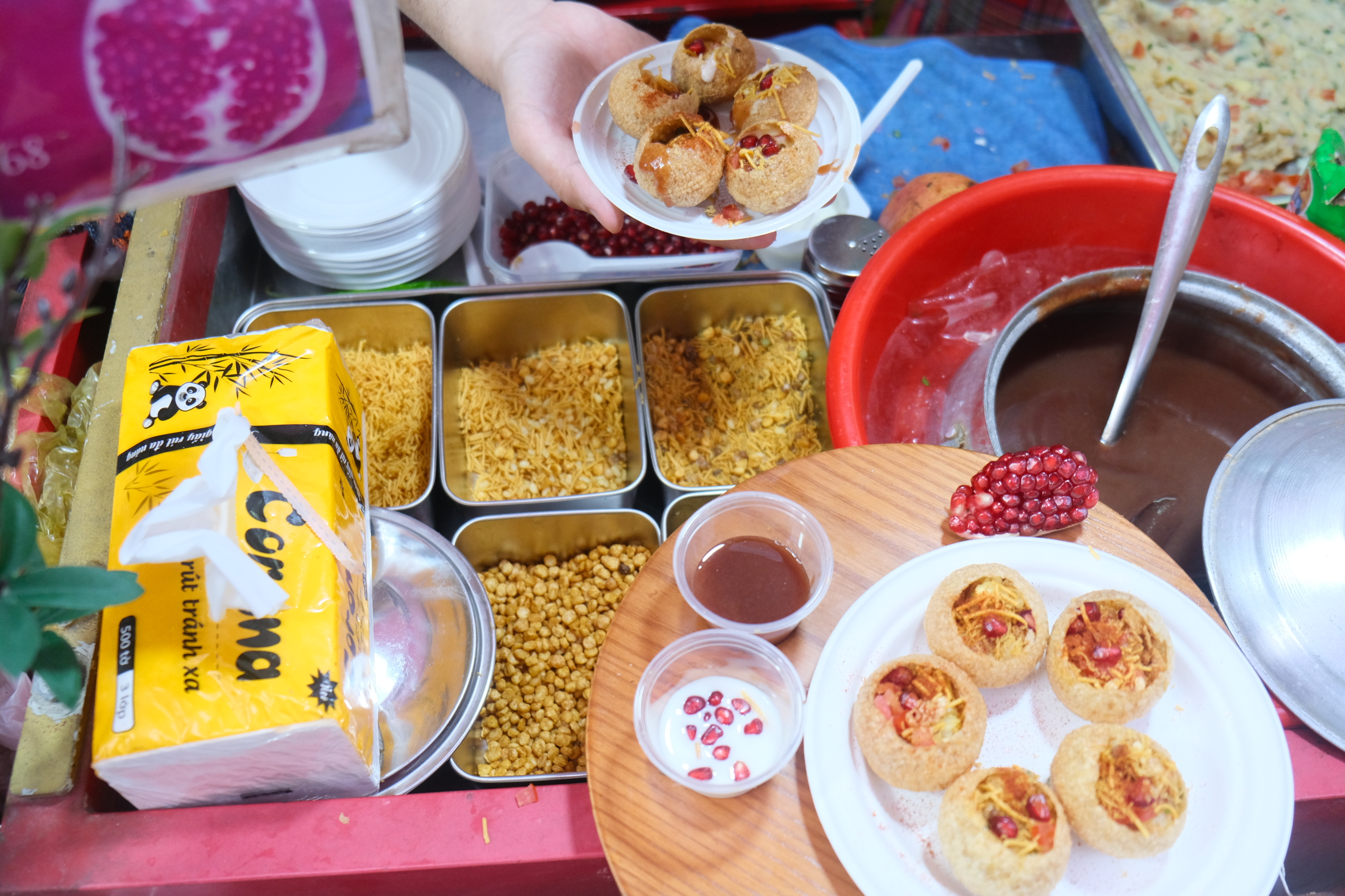All the spices used to make panipuri at Hung's stall are said to be imported from India. Photo: Ngoc Phuong / Tuoi Tre News