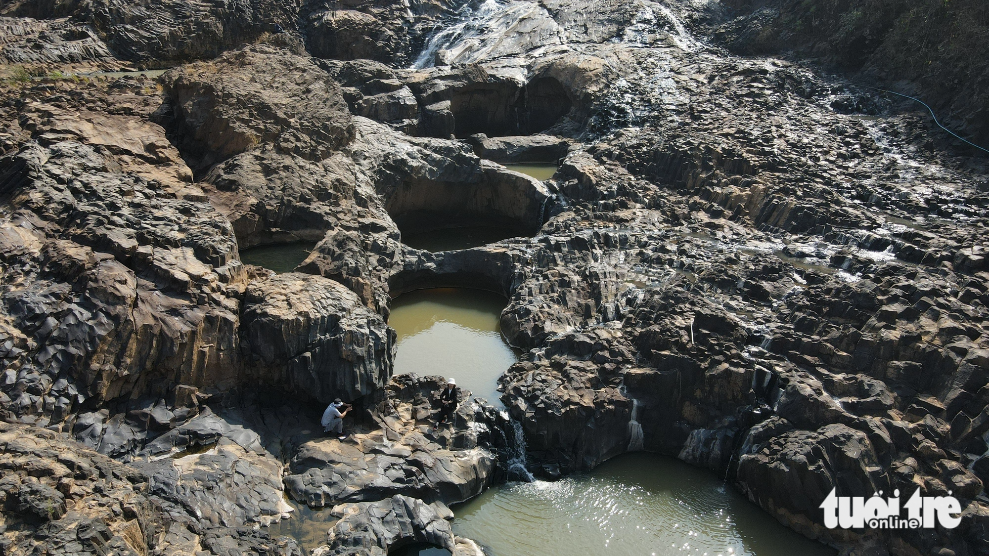 The field includes many small pools measuring several meters each in diameter.