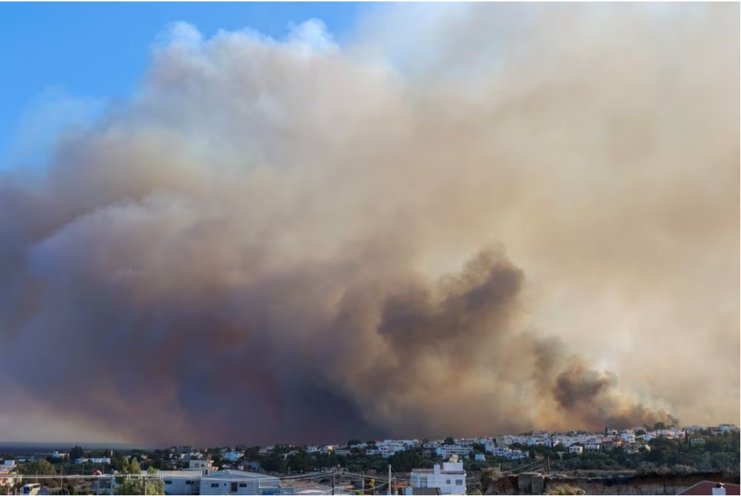 Smoke rises near the village of Gennadi on the island of Rhodes, July 25, 2023. Photo: Reuters