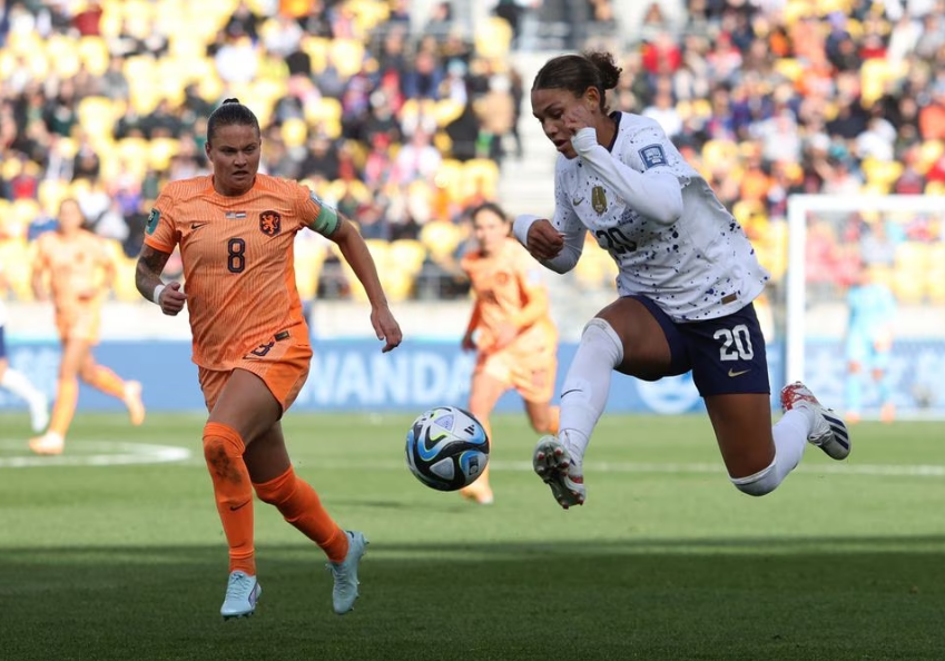 Soccer Football - FIFA Women's World Cup Australia and New Zealand 2023 - Group E - United States v Netherlands - Wellington Regional Stadium, Wellington, New Zealand - July 27, 2023 Trinity Rodman of the U.S. in action with Netherlands' Sherida Spitse. Photo: Reuters