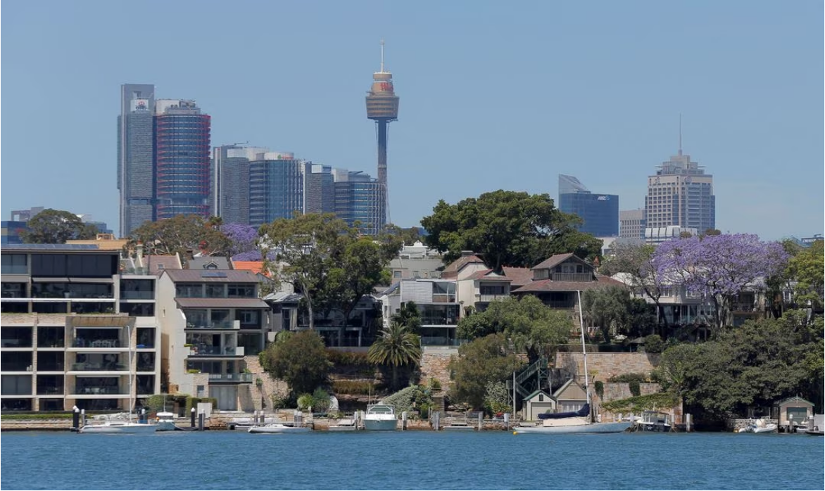 Sydney office buildings and commercial real estate appear behind Sydney waterfront properties in the suburb of Birchgrove, Australia, November 3, 2016. Photo: Reuters