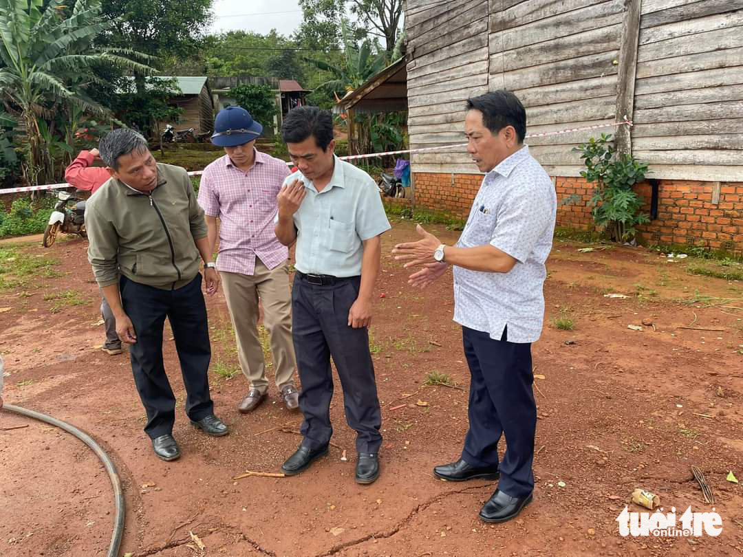 Authorities arrive at the scene where an unusual earth crack appeared in Tuy Duc District, Dak Nong Province, Vietnam, August 1, 2023. Photo: Duc Lap / Tuoi Tre