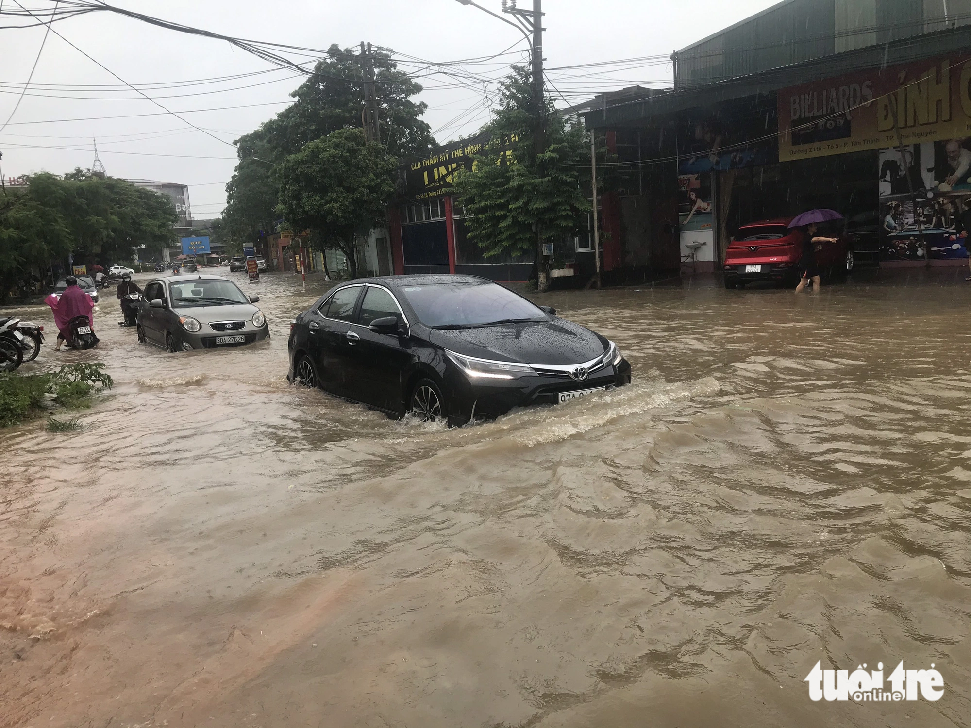 Hour-long rain leaves downtown roads underwater in Vietnam’s Thai Nguyen