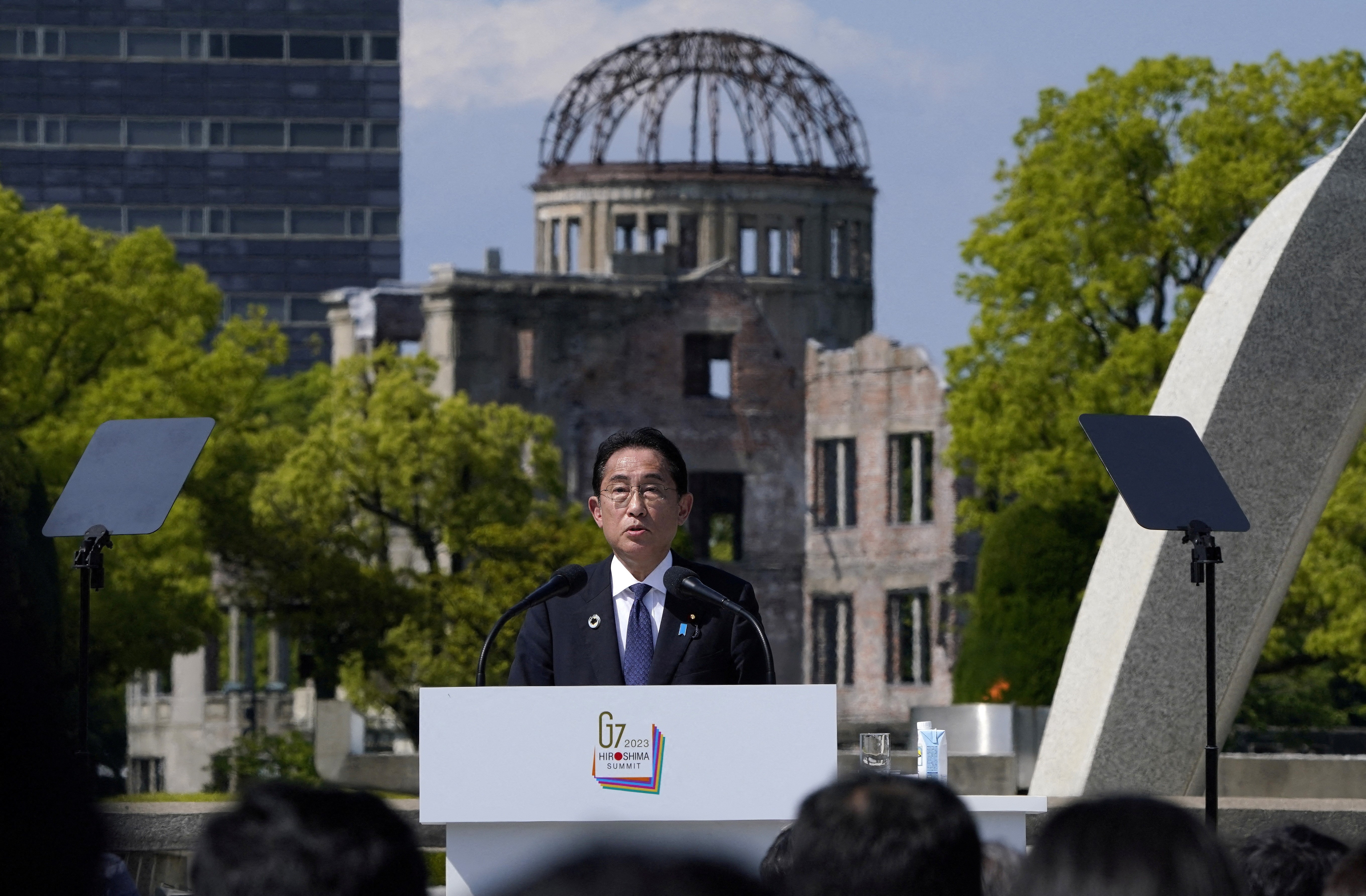 Japan’s Prime Minister Fumio Kishida speaks in front of the Cenotaph for Atomic Bomb Victims and the Atomic Bomb Dome in the Peace Memorial Park during the Presidency Press Conference of the G7 Hiroshima Summit in Hiroshima, Japan, 21 May 2023. Photo: Reuters